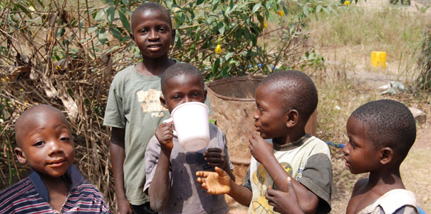 VillageWater:  African Children Drinking Reliable, Safe Drinking Water